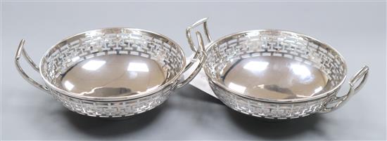 A pair of George V pieced silver two handled bonbon dishes by Asprey & Co, London, 1912, 7.5 oz.